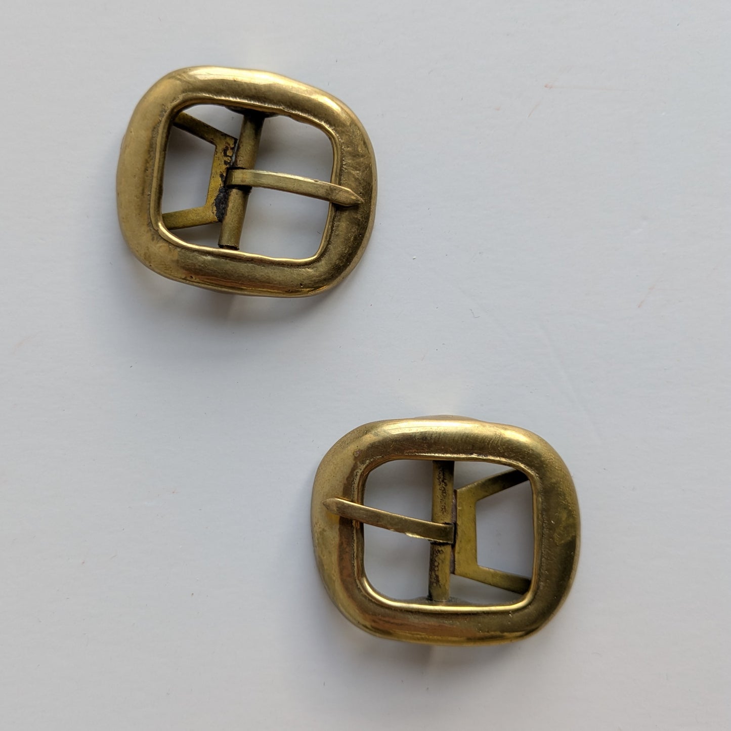 Brass trouser buckles