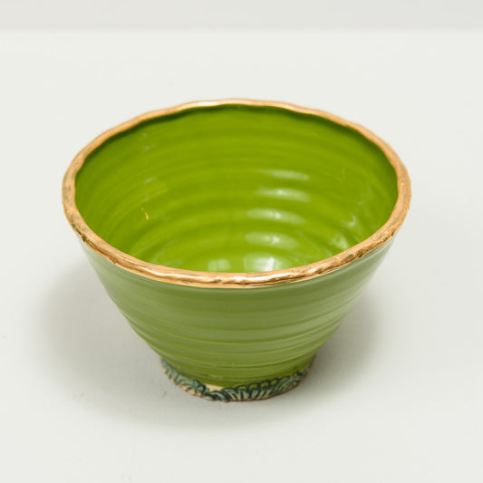 Earthenware bowl with gold rim