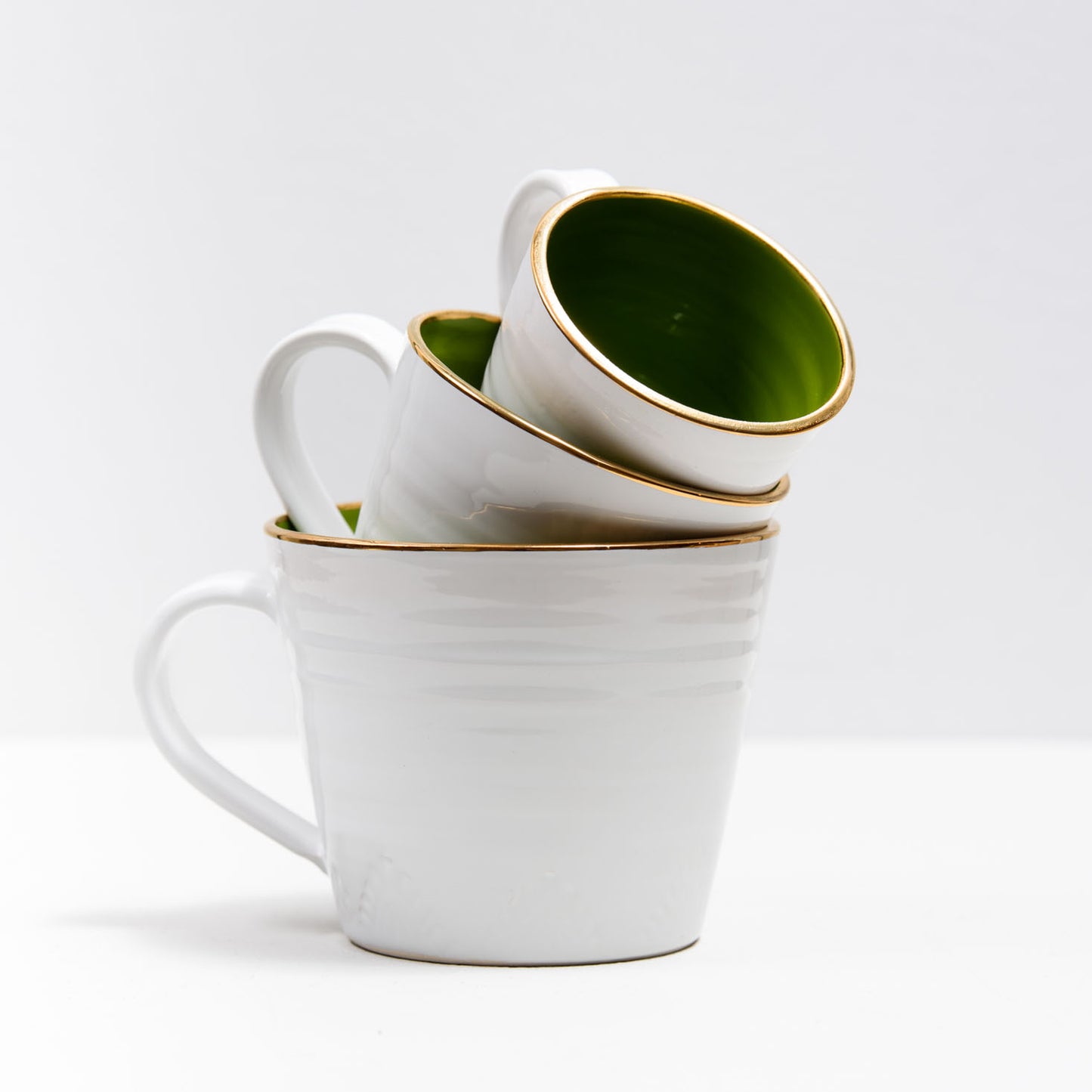 Espresso-/glöggkopp med guldkant i lergods