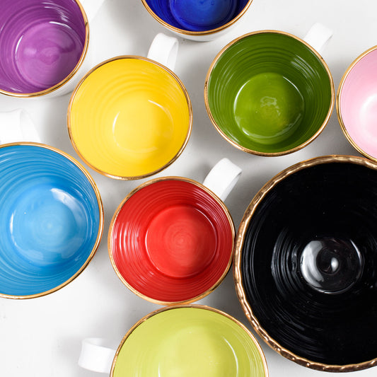 Coffee cup with gold rim in earthenware