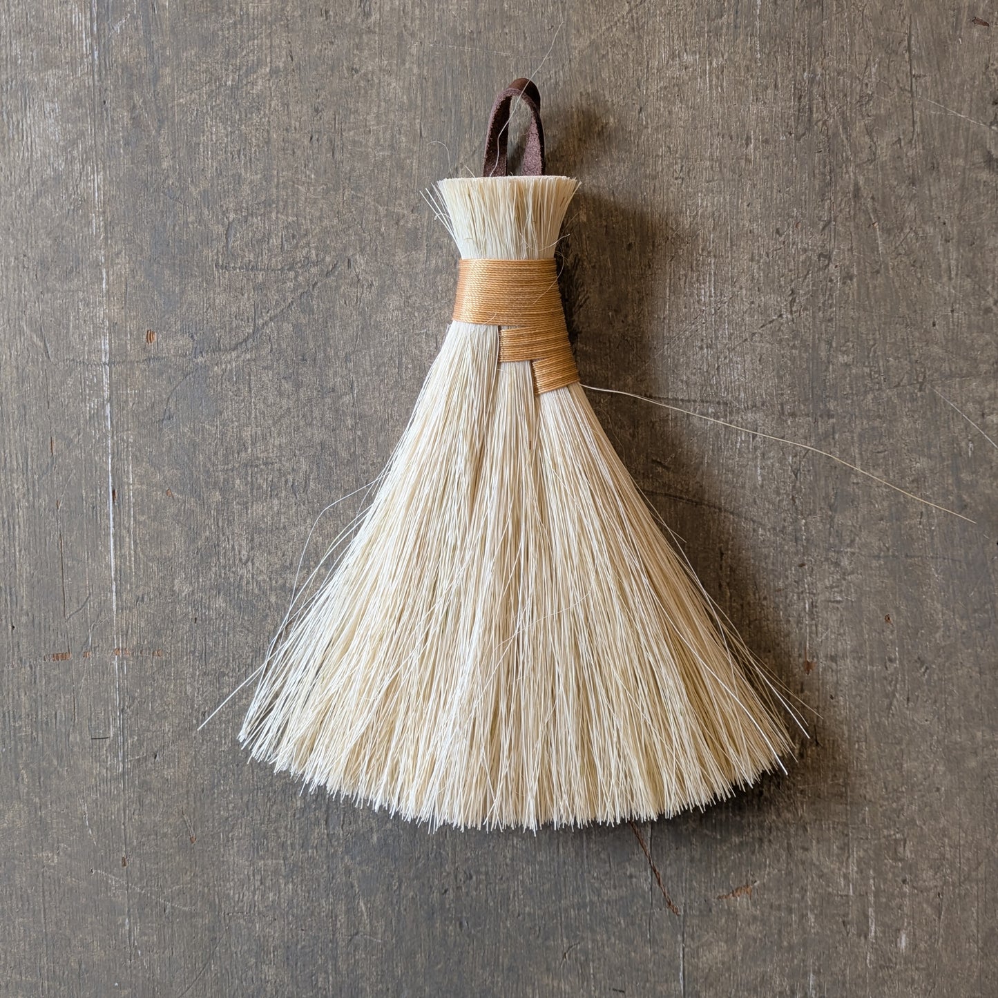 Liten handgjord borste i tampico